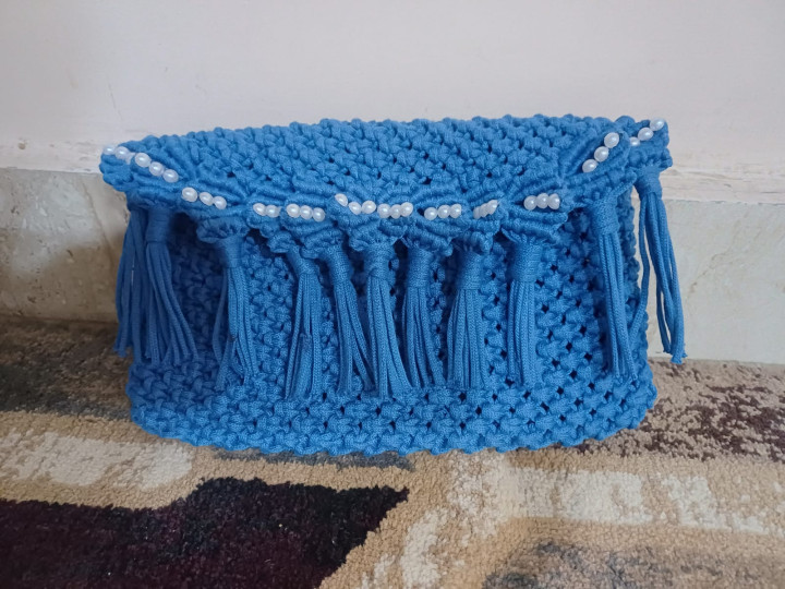 Indigo pearl clutch
