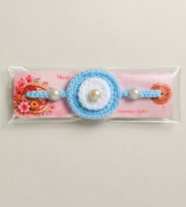 Lite blue, white rakhi